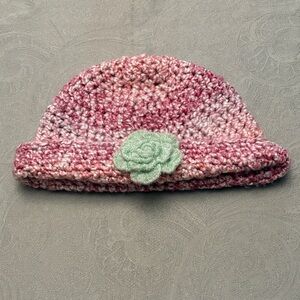 Handcrafted Pink Crochet Hat with Green Flower Accent